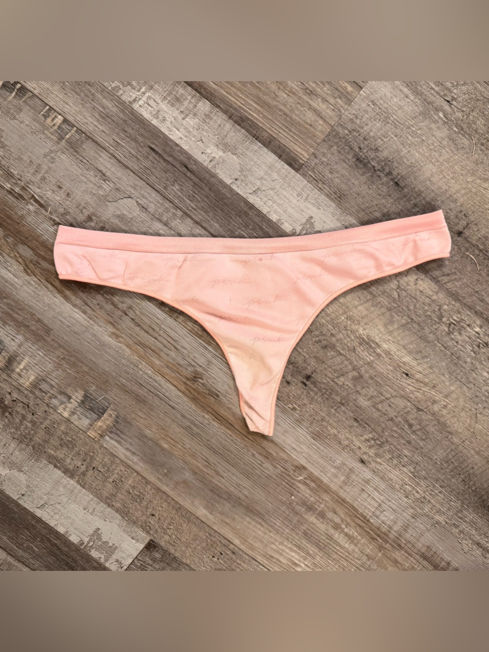Well worn Victoria secret pink thong